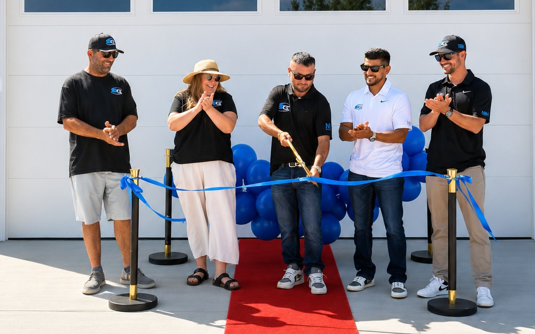 The New Beginning Homes team cutting the ribbon at a finished home